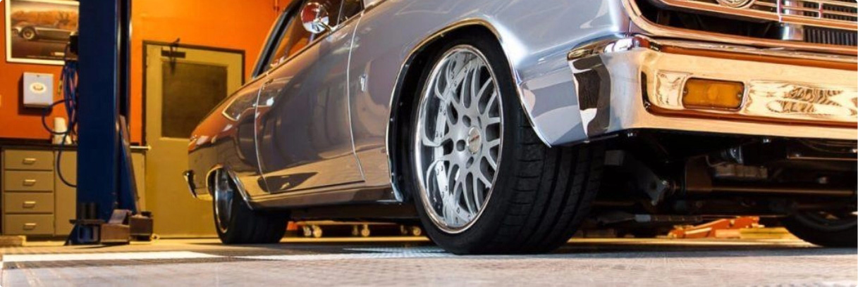 Classic car in garage with rubber flooring