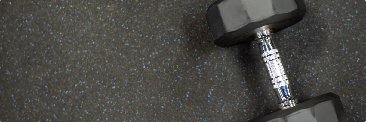 Dumbell on rubber flooring