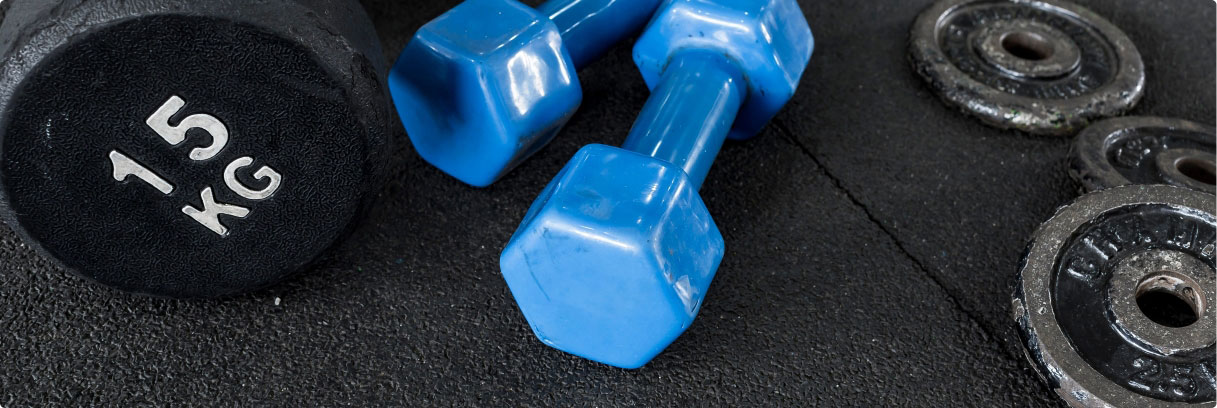 Gym weights on rubber flooring